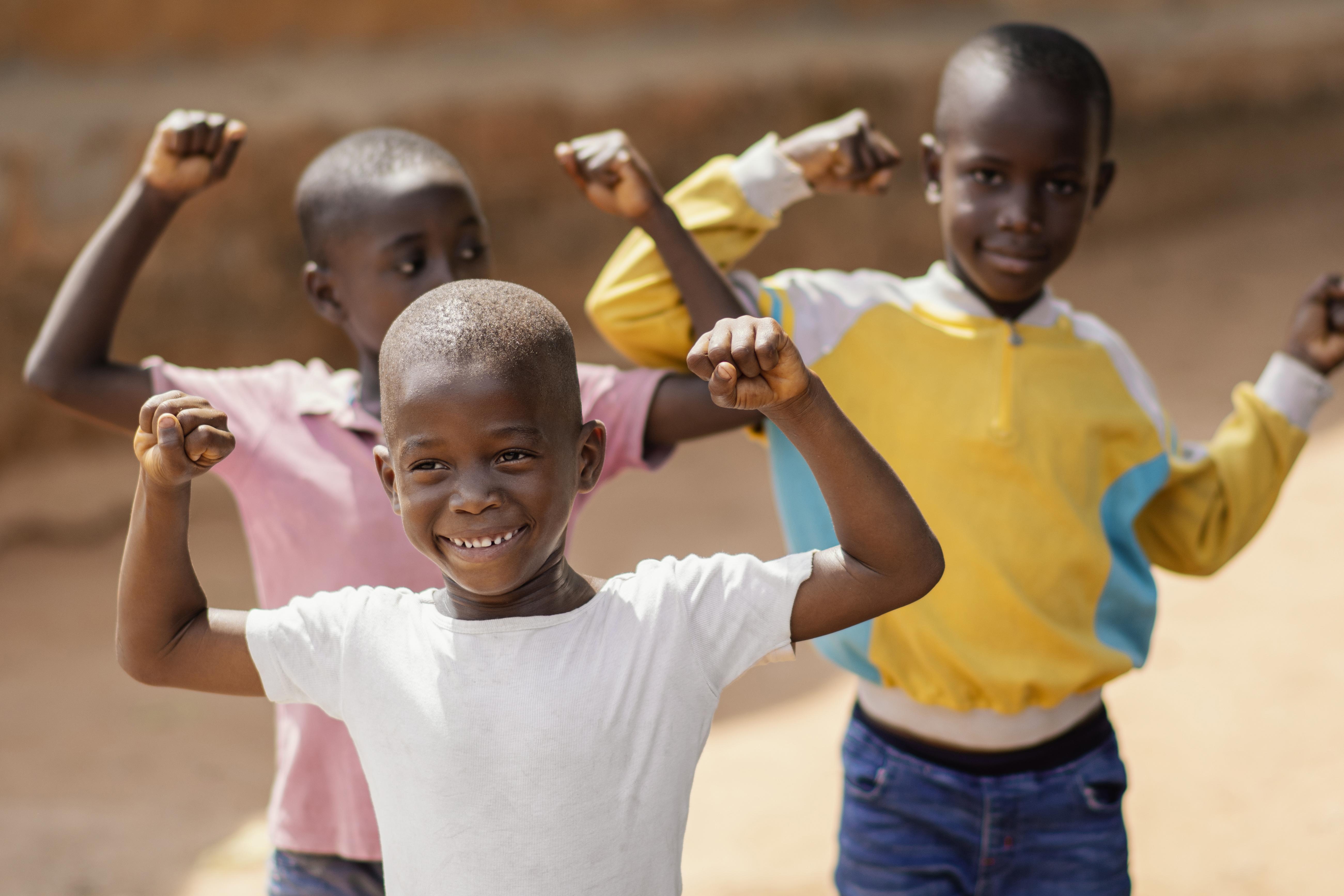 medium-shot-smiley-african-boys